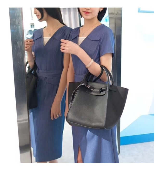 Shoulder Bag, Crossbody Bag, Tote Bag, Wing Bag showcased in stylish outfit with a chic black handbag.