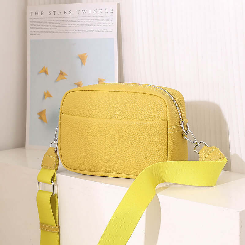 Solid Color Women's Messenger Bag with Wide Strap in bright yellow, featuring a comfortable wide strap and stylish design.