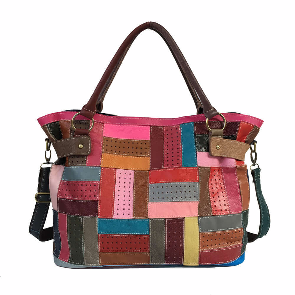 Colorful patterned leather crossbody bag with patchwork design and dual handles.