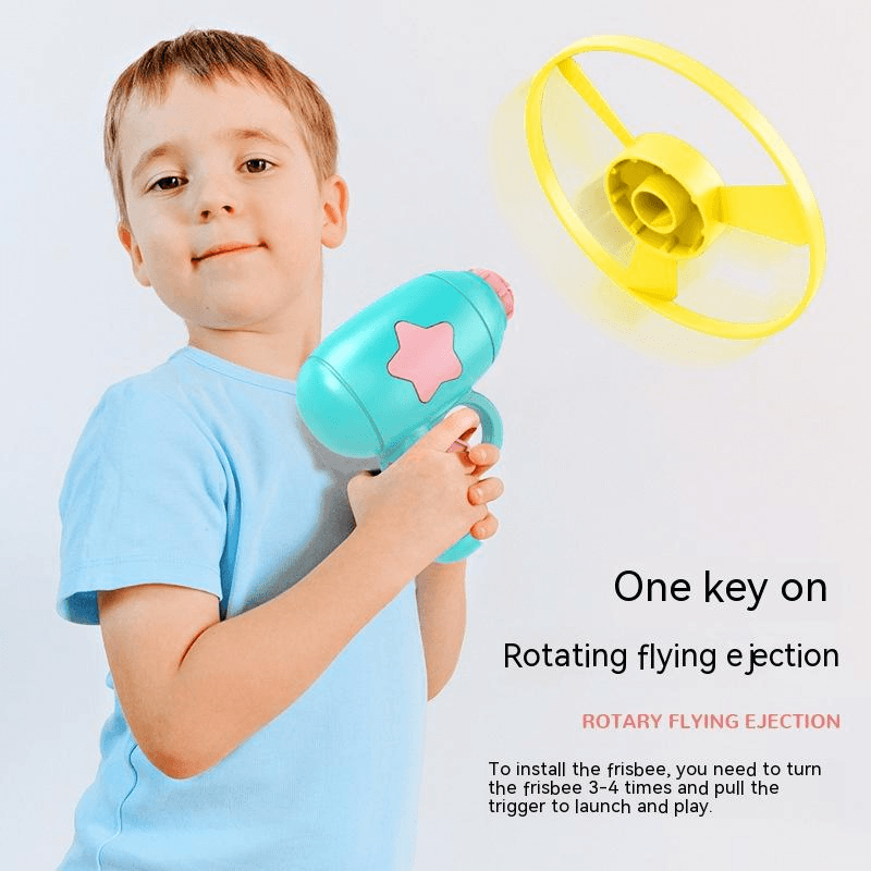 Training Launcher With Flying Discs showing a child using the toy with a yellow flying disc in motion.