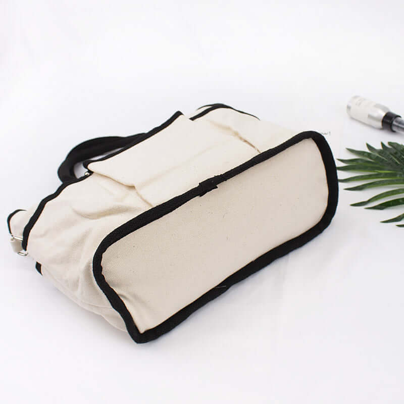 Shoulder Bag, Tote Bag, Crossbody Bag displayed on a flat surface with a minimalistic design and black trim.