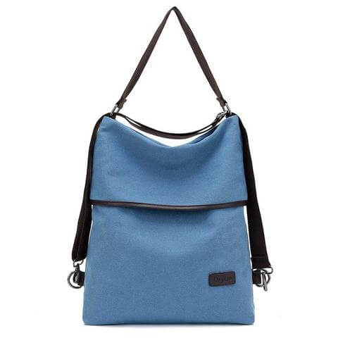 Canvas Women's Bag - Versatile Crossbody Backpack in stylish blue color with adjustable straps.