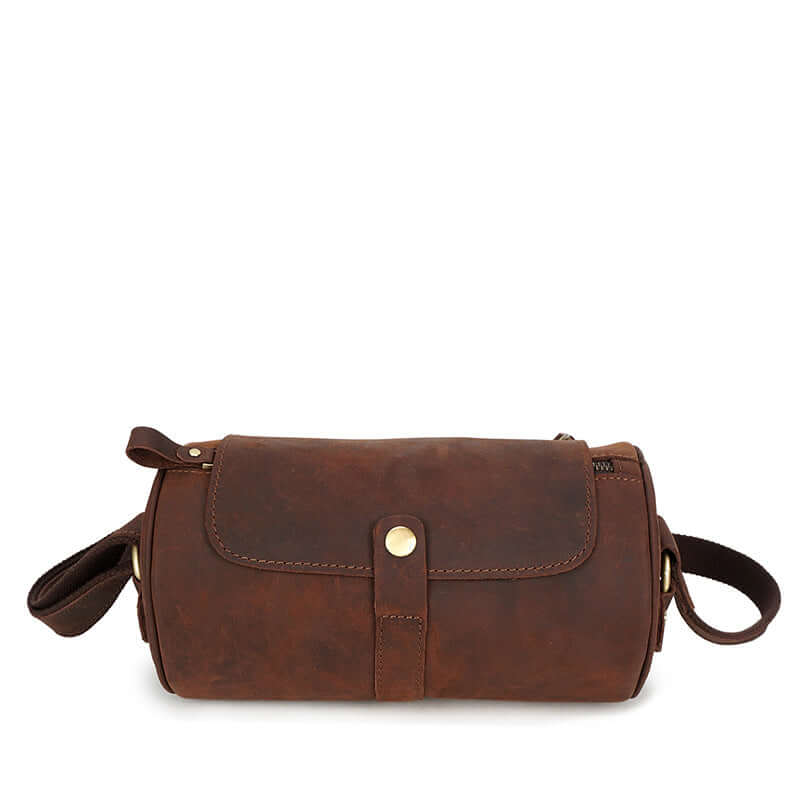 leather crossbody messenger bag featuring a stylish cylindrical design in rich brown leather.