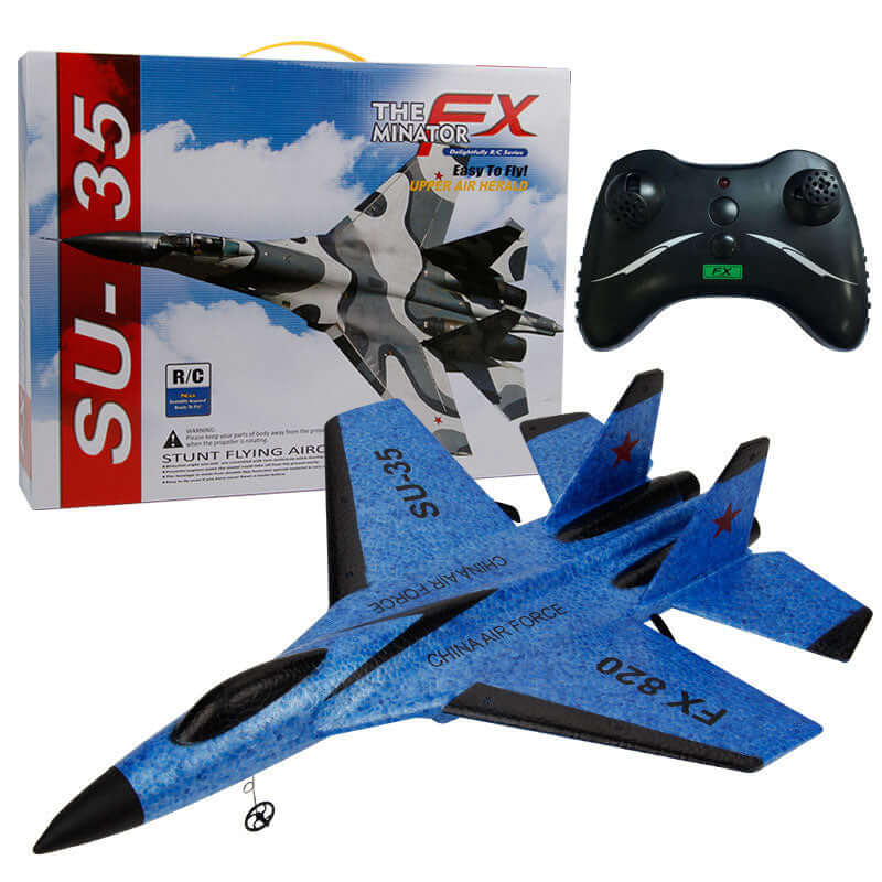 FX820 Electric Remote Control Mini Fighter Plane Model with controller against its box.