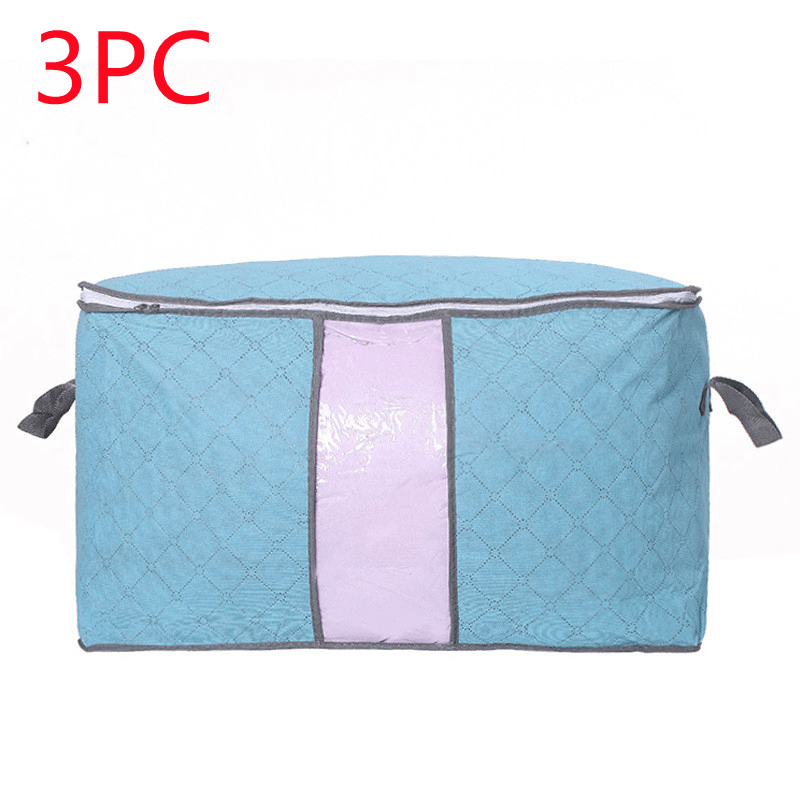 Storage Bag Quilt Storage Bag Moving Packing Bag Clothes Sorting Bag Clothing Duffel Bag in blue and purple design.