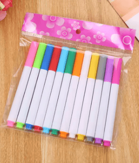 12 color liquid chalk set in a zippered pouch, featuring vibrant chalk markers on a wooden table.