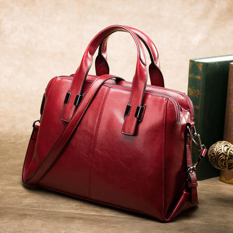 Fashionable Women's Leather Motorcycle Shoulder Bag in red, showcasing stylish design and durable leather craftsmanship.