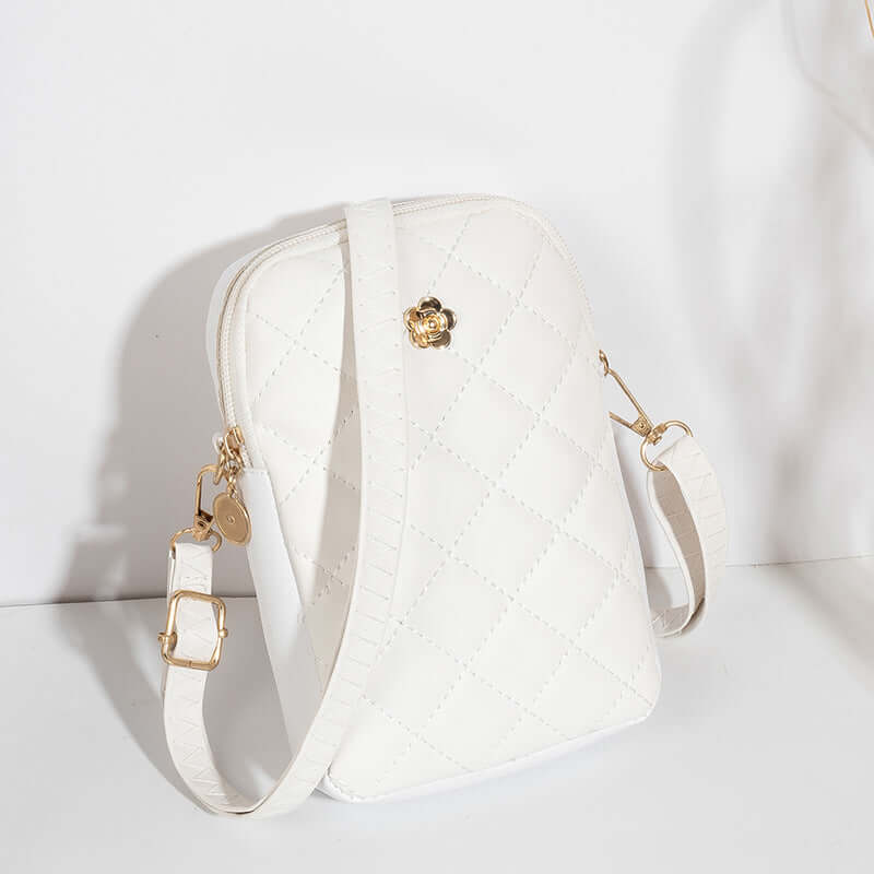 Embroidered Women's Crossbody Bag for Travel and Commuting in white with gold accents.