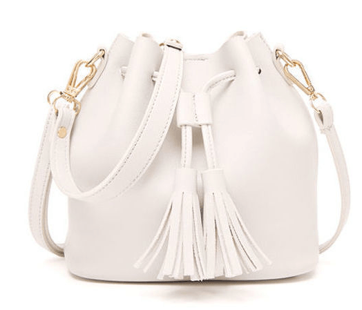 Stylish bucket bag featuring a chic white design and tassel, perfect for daily use and outings.
