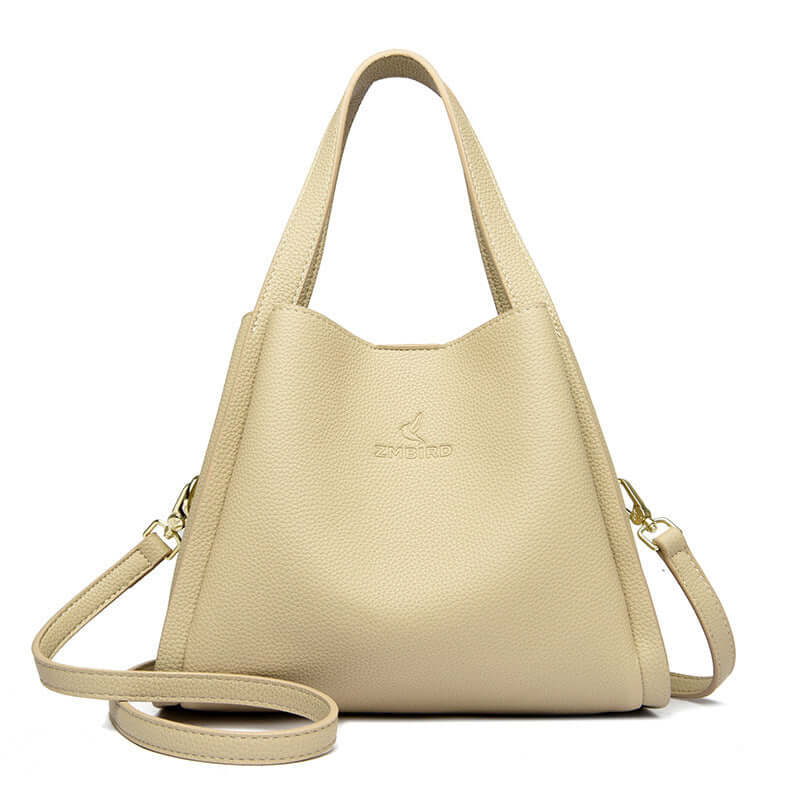 Stylish women's crossbody tote bag in beige PU material, perfect for daily use and chic fashion.