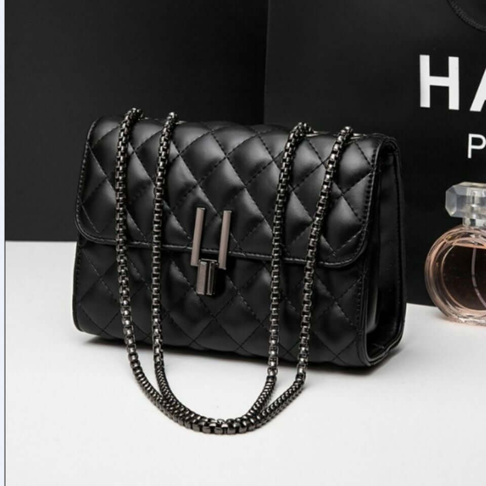 Trendy Women's Single Shoulder Messenger Handbag in elegant black quilted design with chain strap.