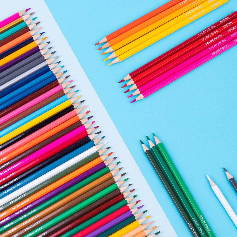 Colored Pencil Set for Kids displayed on a blue background, showcasing vibrant colors for young artists.