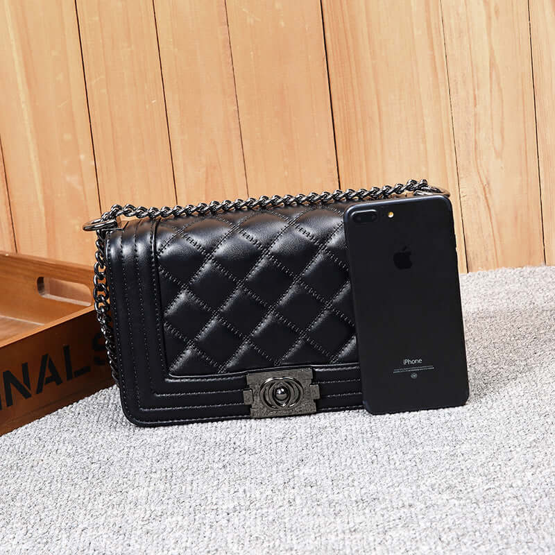 Chain Bag, Crossbody Bag, Shoulder Bag displayed next to an iPhone, showcasing its chic design and functionality.