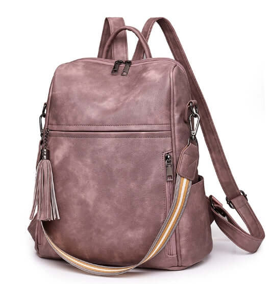 Fashionable Women's PU Anti-theft Travel Backpack in stylish pink color with elegant design and storage options.