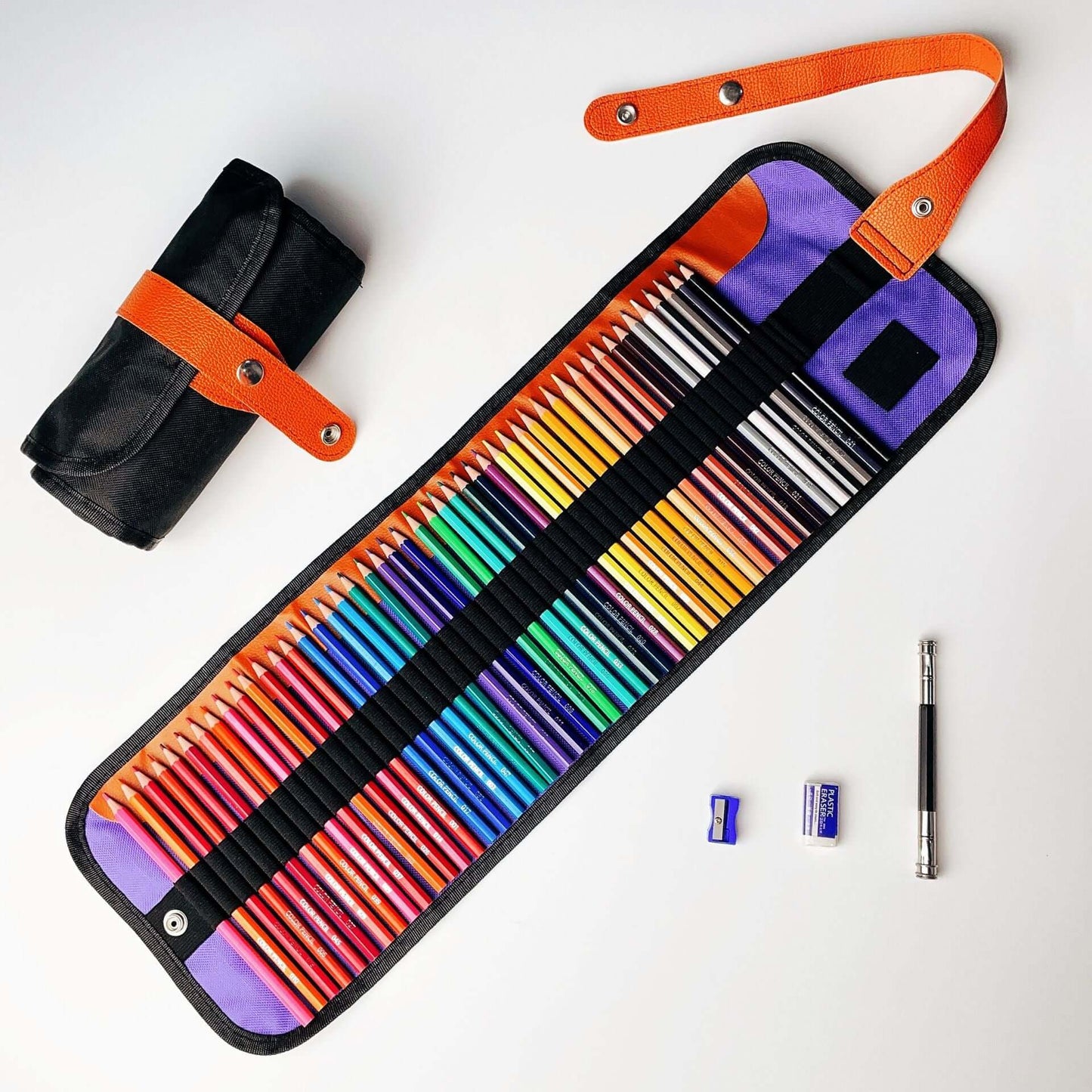 Professional Oil and Water-Soluble Colored Pencils Set displayed in a roll-up case with sharpeners and a pencil.