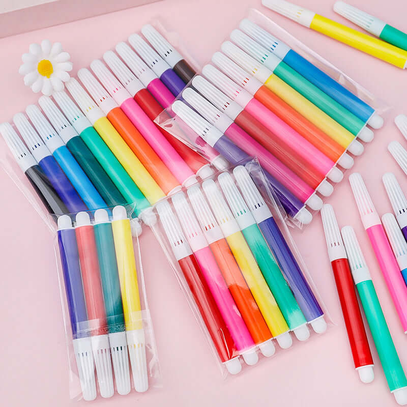 Creative Mini 6-Color Washable Art Markers for Kids displayed in colorful packs on a pink background.