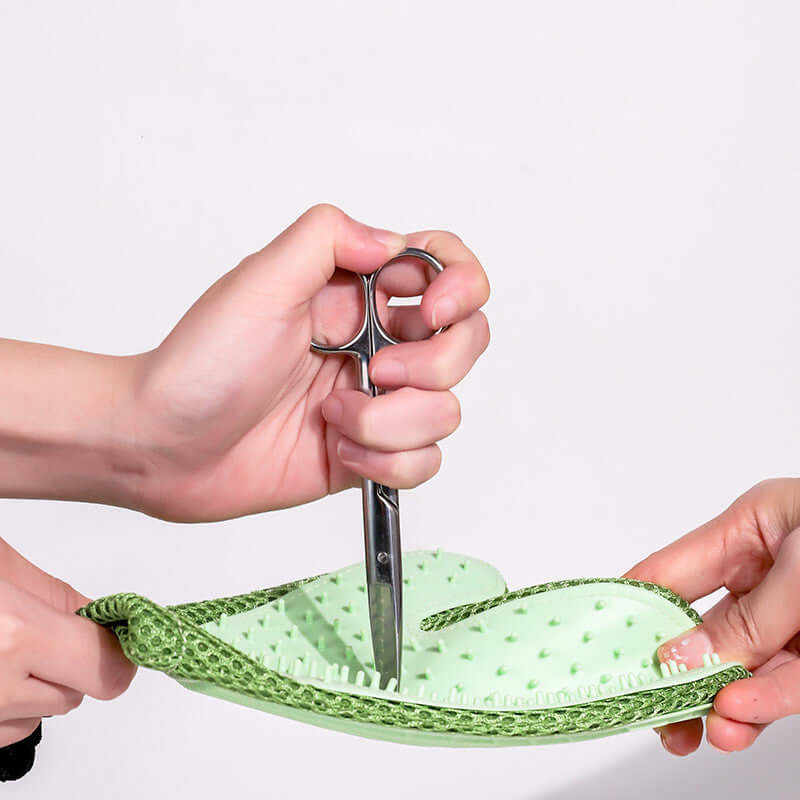 Silicone Massage Gloves and Pet Hair Removal Brushes being used with scissors for grooming.