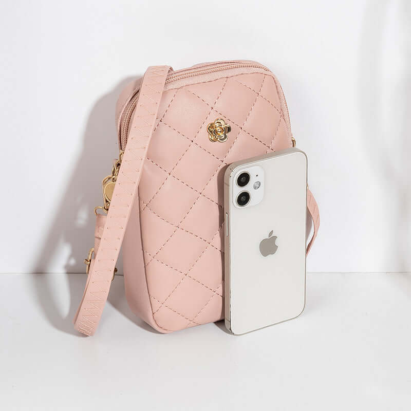 Embroidered Women's Crossbody Bag next to a mobile phone on a white background.
