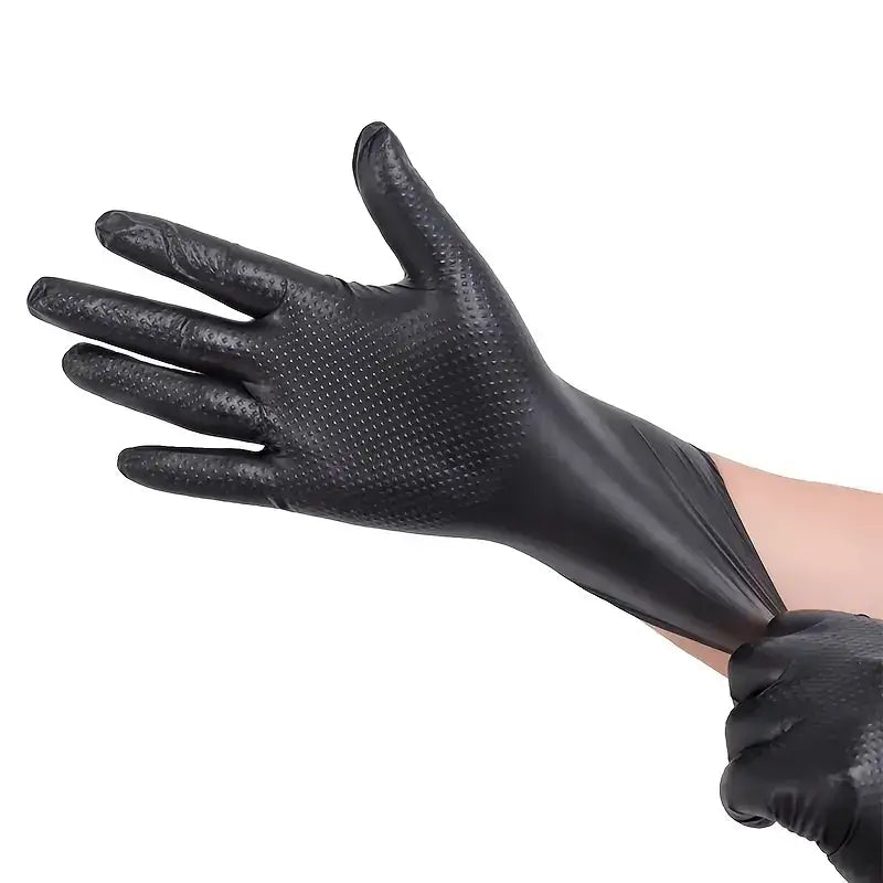 Hand wearing Diamond Pattern Nitrile Gloves, showcasing their durable and flexible design.