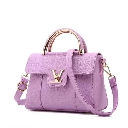 Chic shoulder crossbody tote bag collection in lavender with gold accents and a stylish handle.