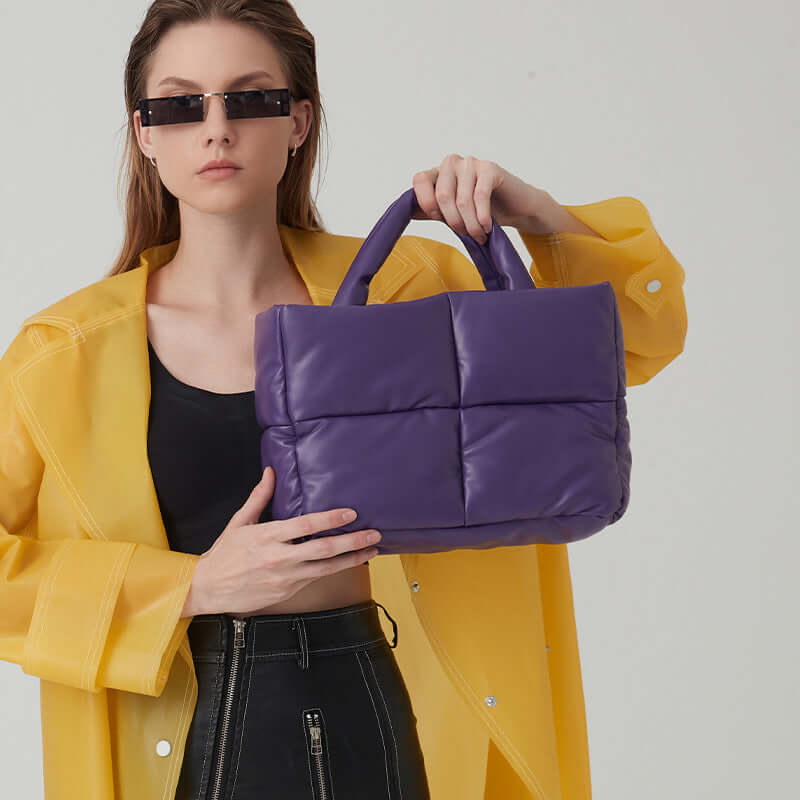 Women's Quilted Square Tote Bag for Autumn/Winter in purple color, modeled by a woman in stylish attire.