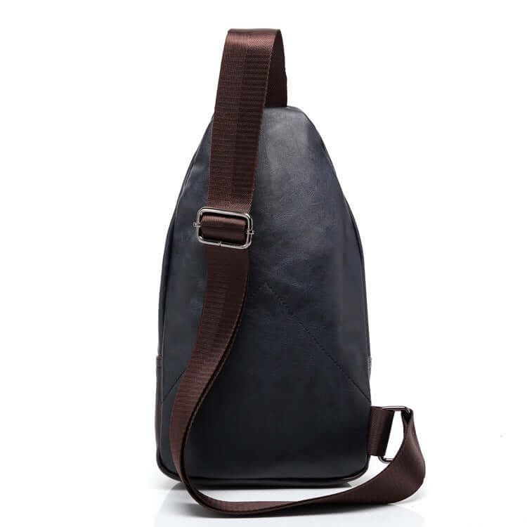 Men's waterproof chest bag shown from the side with a brown strap and sleek design.