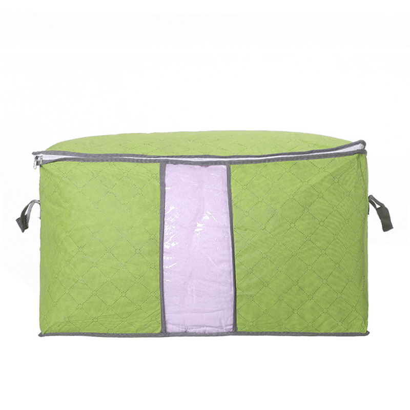 quilt storage bag for moving in vibrant green with transparent front and sturdy handles for easy carrying.