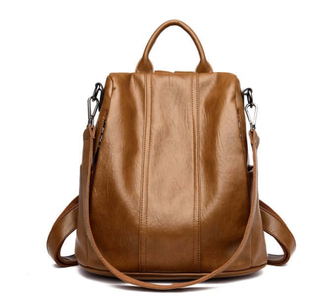 Anti-Theft Women's Backpack, Shoulder Bag in brown leather with stylish design and adjustable shoulder straps.