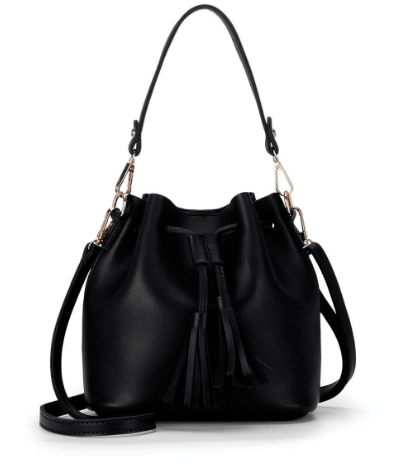 Stylish bucket bag in black with tassel detail, perfect for chic urban styling and daily use.